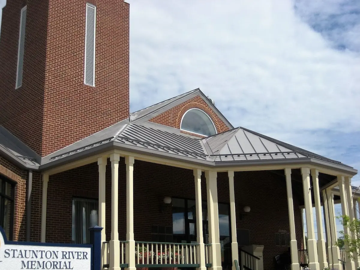 Skilled roofing craftsmen working on a residential roof in Milleville Beach
